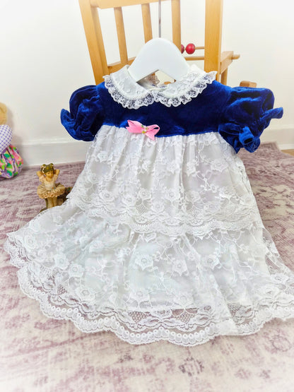 18-24 months. Vintage Roanna, navy velvet chest and sleeves with white lace layers and collar and pink satin bow
