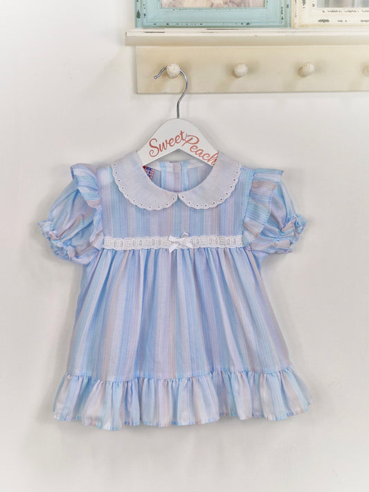 9-12 months. Pastel blue and lilac striped dress with white collar and details. New York Kids