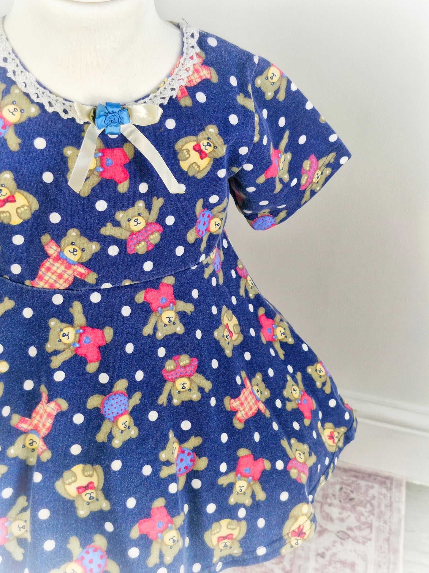 3-4 years. Navy vintage flare top with teddy bear print, ribbon & rose