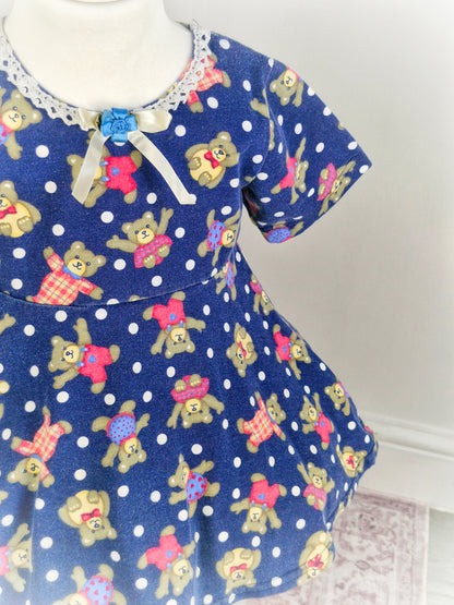 3-4 years. Navy vintage flare top with teddy bear print, ribbon & rose