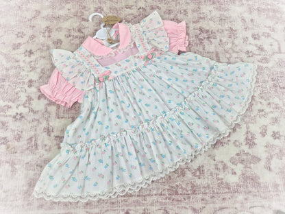 12-18 months. White vintage dress with floral design, frills, rosettes and satin bows
