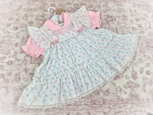 12-18 months. White vintage dress with floral design, frills, rosettes and satin bows