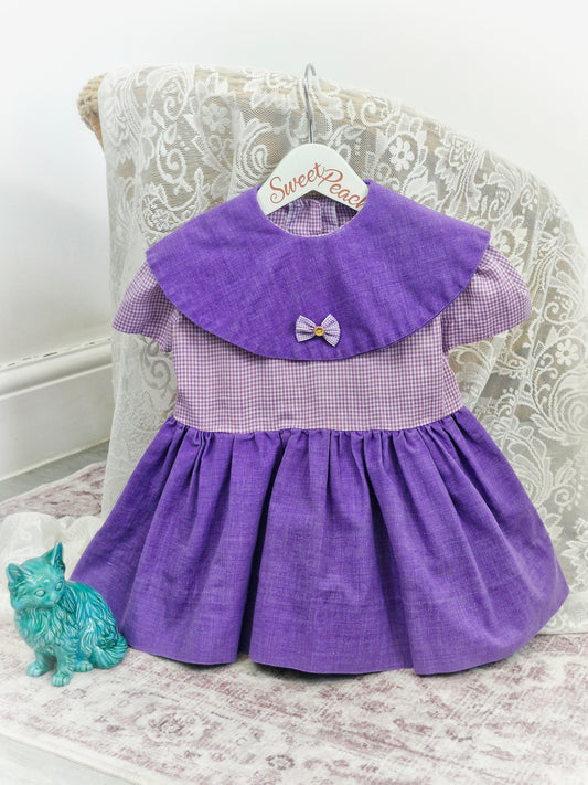 2 years. Purple gingham dress with bib. Handmade