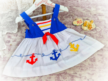 12-18 months. Sleeveless sailor themed vintage dress