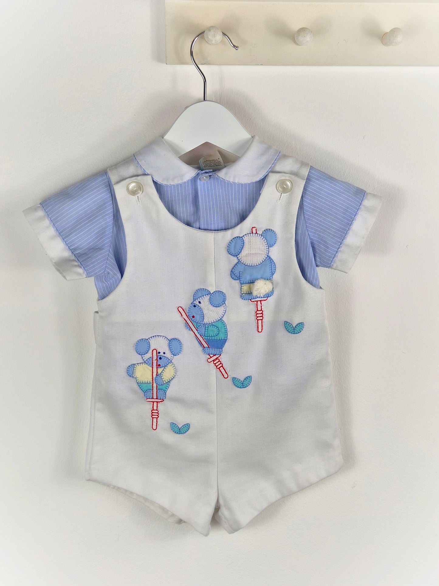 9-12 months. Two piece vintage set, blue shirt and white, short overalls