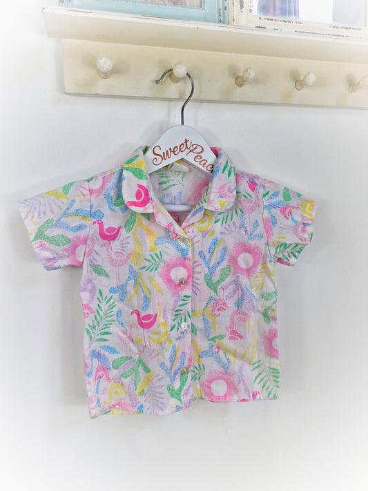 12-18 months. White button up shirt with bright flamingo patterns