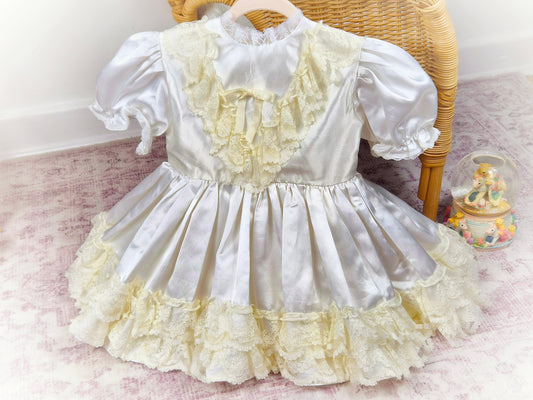 2 years. Satin vintage dress with lace layers and puff sleeves