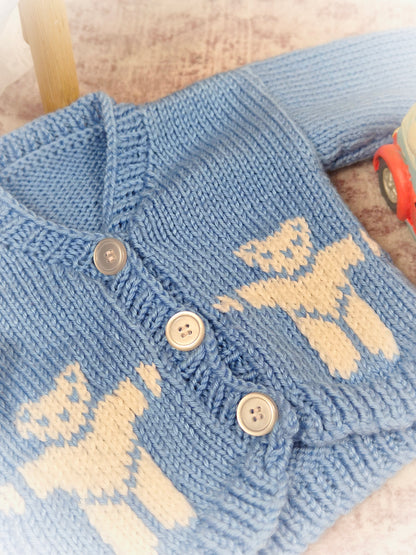 3-6 months. Blue and white knitted cardigan with teddy bears