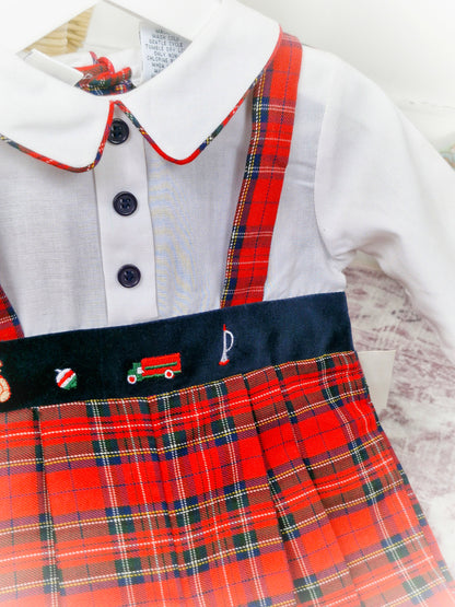 12 months. Red tartan vintage romper, long sleeves, collar and buttons. Embroidered with toys.