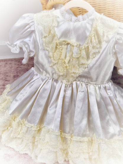 2 years. Satin vintage dress with lace layers and puff sleeves