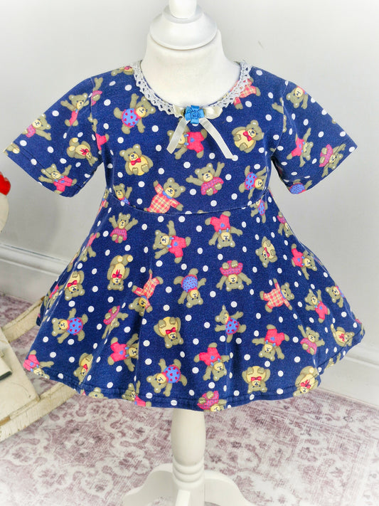 3-4 years. Navy vintage flare top with teddy bear print, ribbon & rose