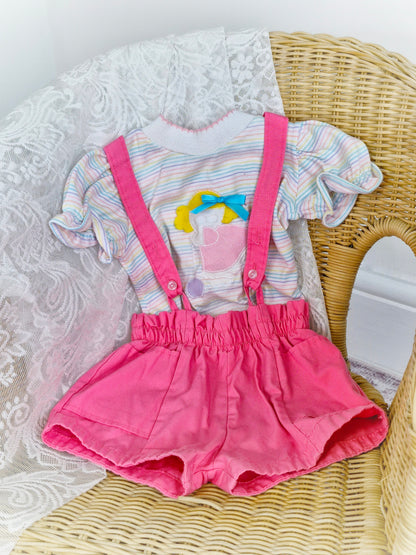 Best fit 12-18 months. Pastel striped Tshirt and pink shorts dungarees set