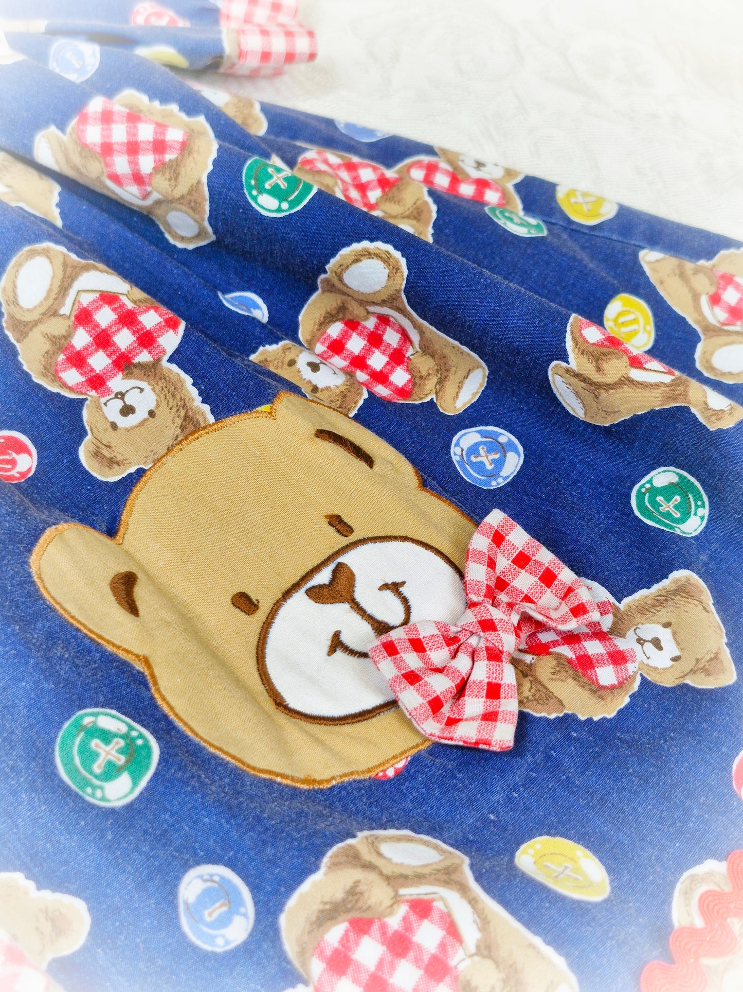 2-3 years. Vintage navy teddy dress with white bib and red gingham details. Mayfair Kids