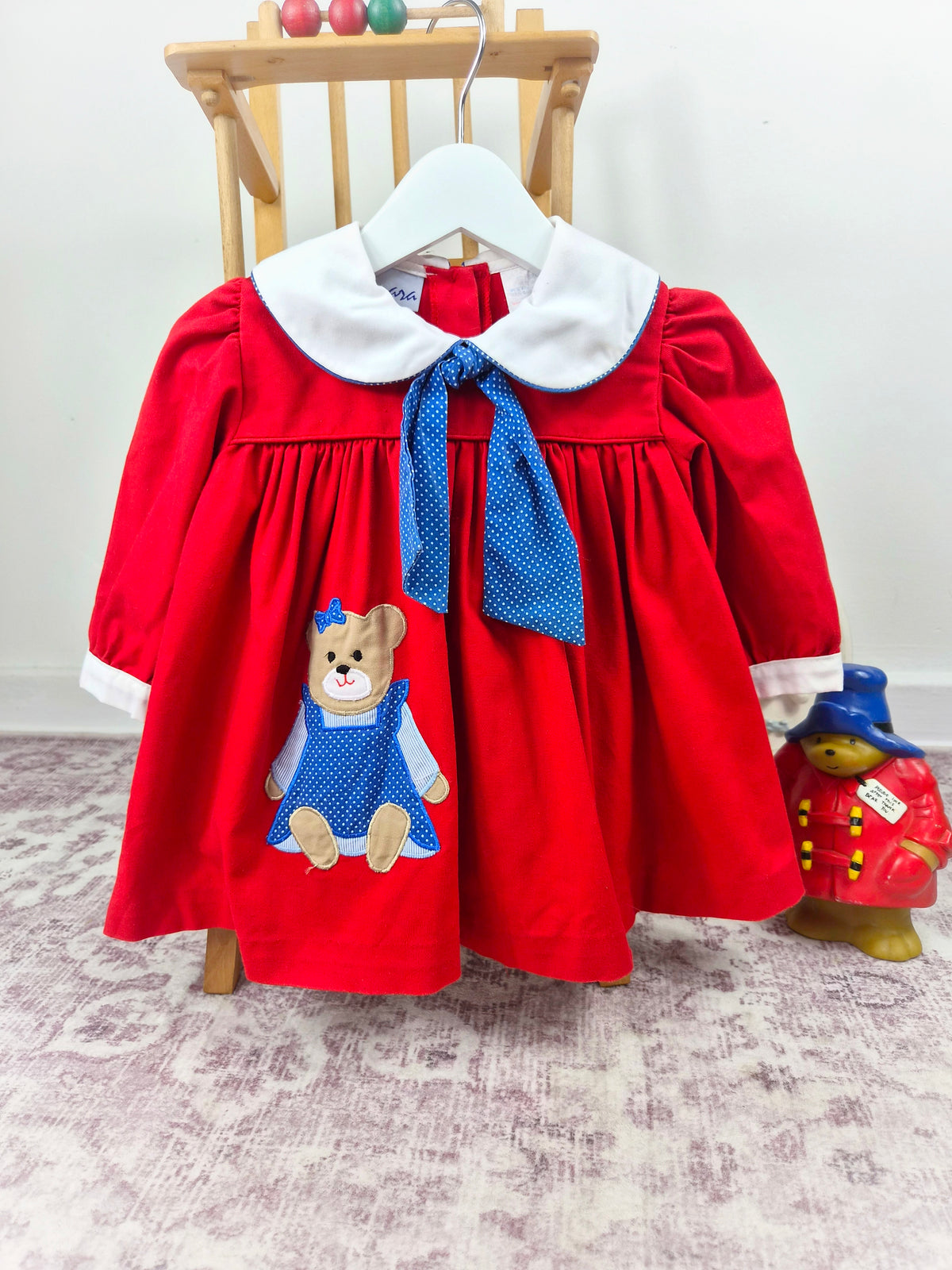 18-24 months. Red vintage Samara dress with navy polka dot neck tie, white collar and teddy bear applique