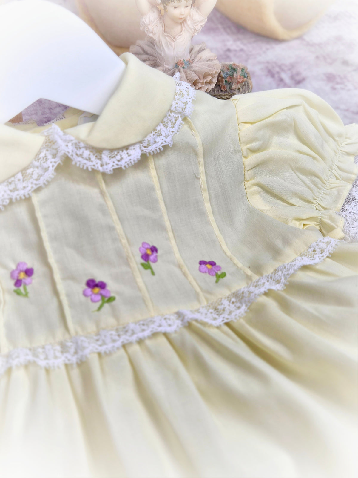 0-3 months. Lemon vintage dress with lace details, puff sleeves and embroidered flowers