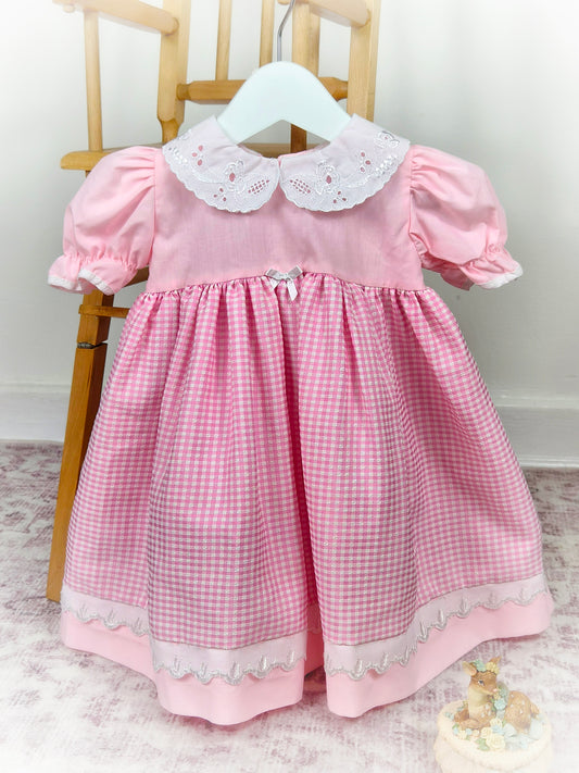 12 months. Pink and white gingham vintage dress with white collar and puff sleeves