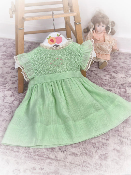 12 months. Mint vintage smock dress with flutter sleeves and sweet embroidered details