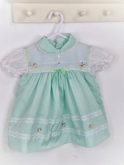 12 months. Mint and white Cradle Togs with rosette, lace and ribbon details
