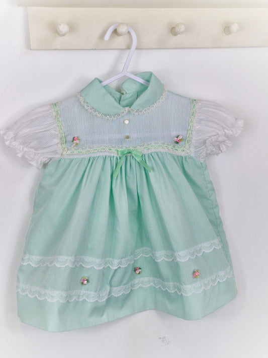 12 months. Mint and white Cradle Togs with rosette, lace and ribbon details
