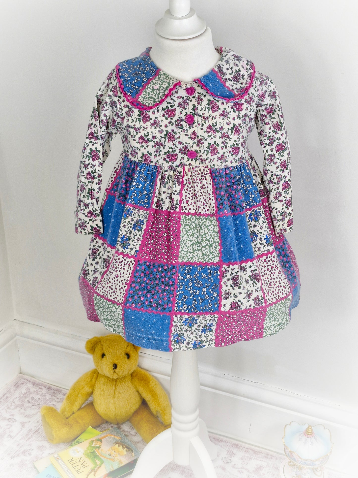 2-3 years. Floral dress, made in USA.