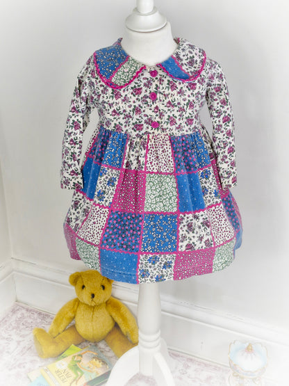 2-3 years. Floral dress, made in USA.