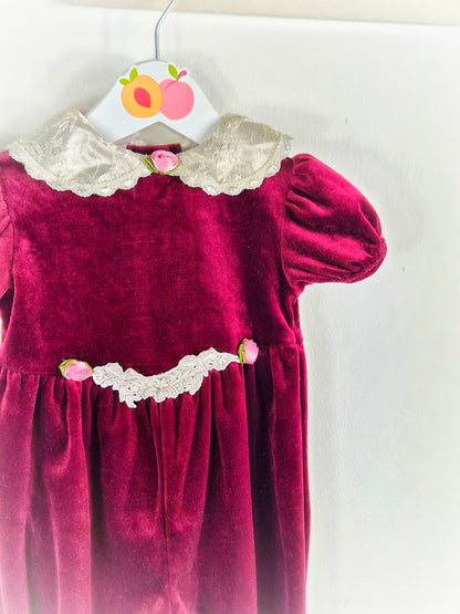 6-9 months. Vintage burgandy romper, velour with cream lace details and pink rosettes