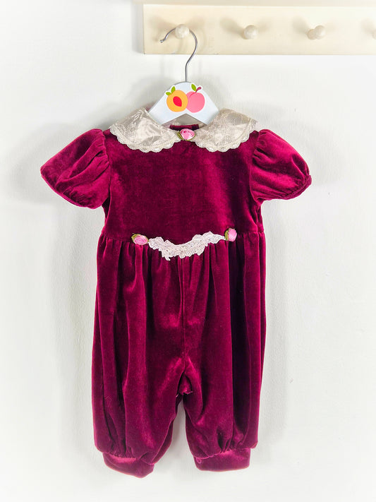 6-9 months. Vintage burgandy romper, velour with cream lace details and pink rosettes